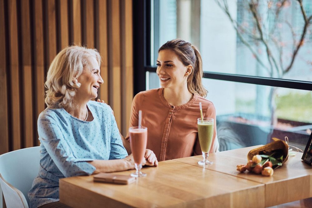 mother and daughter speaking about rehab and addiction treatment